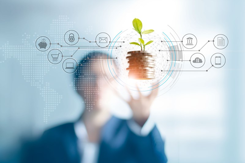 Person in background holding out coins with leaves sprouting on top, surrounded by icons of modern technology