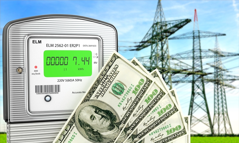 Picture of a smart meter, dollar notes (denoting savings) and transmission towers (denoting smart grid)